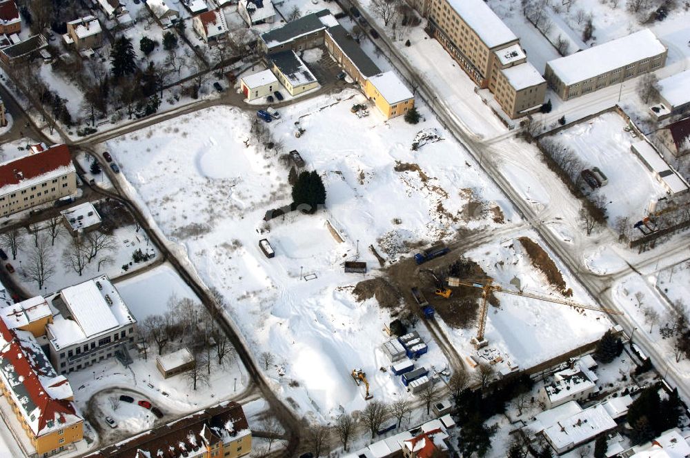 Berlin aus der Vogelperspektive: Abrissfläche auf dem Gelände des Vivantes Klinikum Berlin - Hellersdorf / Look at the wintry, snowy surface on the site of the demolished Vivantes Klinikum Berlin - Hellersdorf