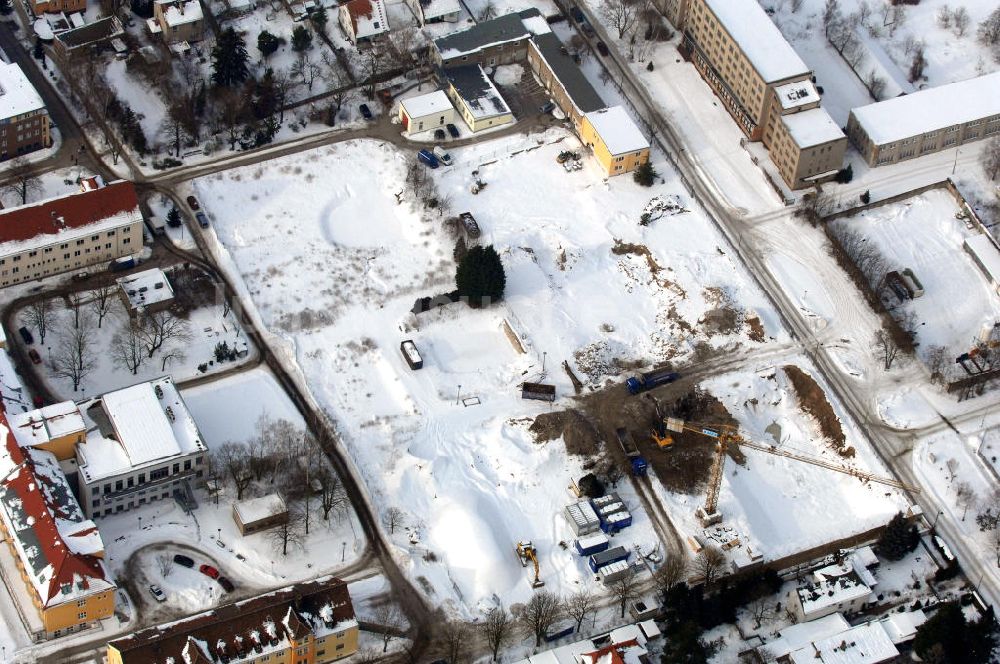 Luftbild Berlin - Abrissfläche auf dem Gelände des Vivantes Klinikum Berlin - Hellersdorf / Look at the wintry, snowy surface on the site of the demolished Vivantes Klinikum Berlin - Hellersdorf