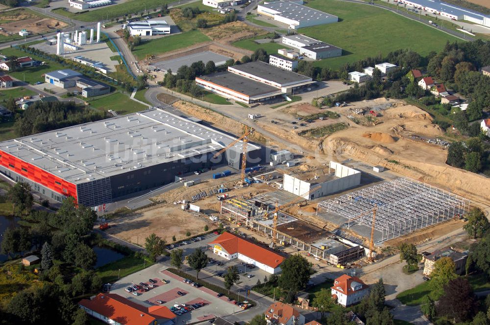 GROßRÖHRSDORF von oben - Auf- und Ausbau des Werksgeändes der SUNFILM AG in Großröhrsdorf