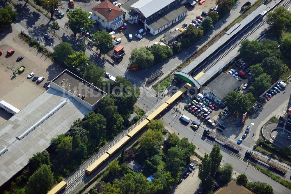 Luftaufnahme Berlin - Bahnübergang Buckower Chaussee an der Bahnstrecke Dresdner Bahn zum gleichnamigen S- Bahnhof in Berlin