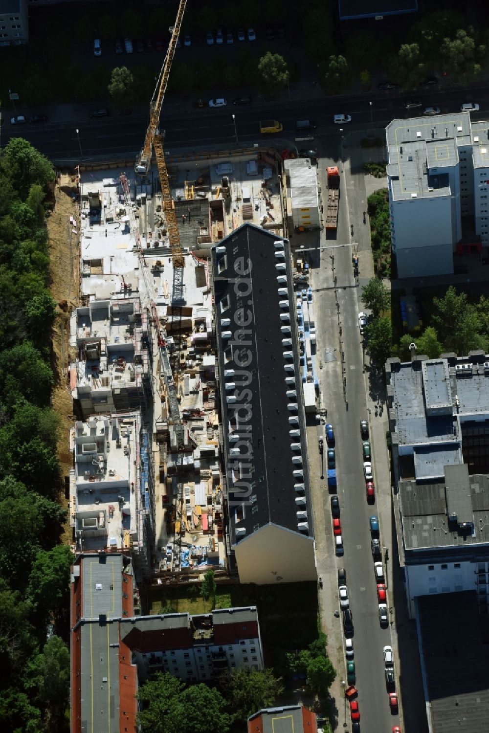 Luftbild Berlin - Baustelle der Dolphin Trust GmbH zum Neubau einer Mehrfamilienhaus-Wohnanlage Carrée Alte Post an der Dottistraße - Ruschetraße im Ortsteil Lichtenberg in Berlin, Deutschland