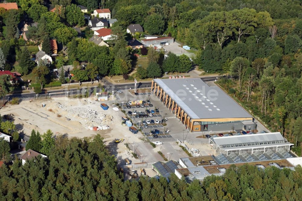 Hohen Neuendorf von oben - Baustelle eines neuen Einkaufszentrums und Supermarkt- Filiale von REWE in Hohen Neuendorf im Bundesland Brandenburg