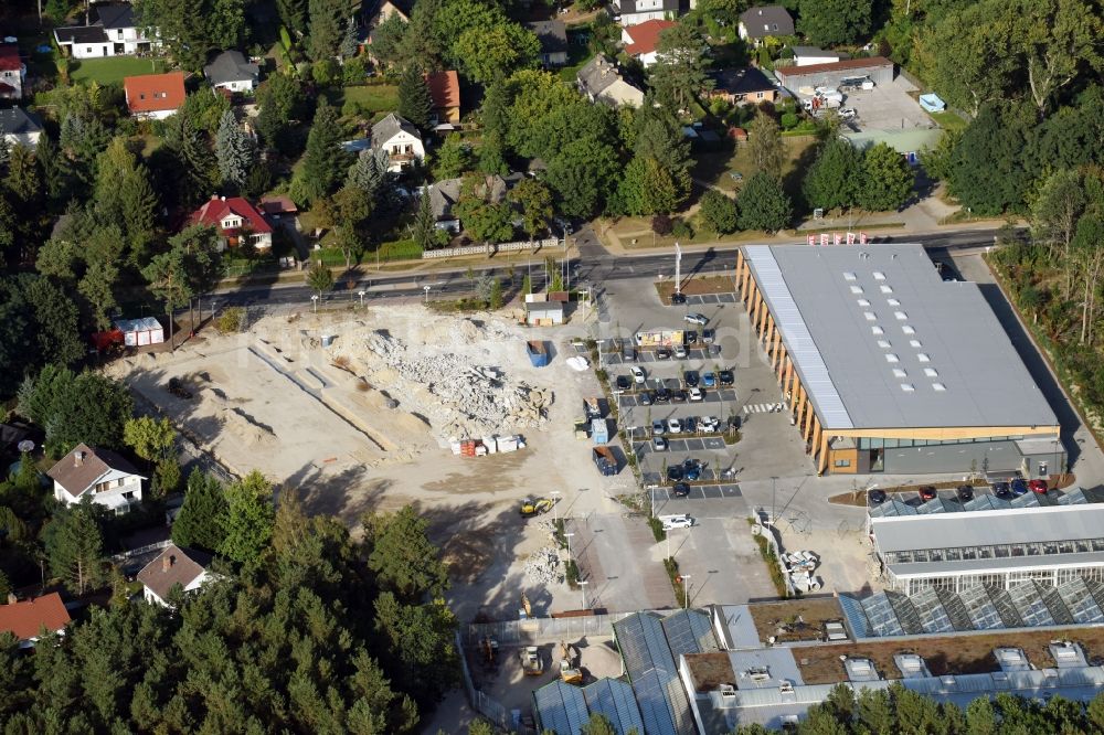 Luftbild Hohen Neuendorf - Baustelle eines neuen Einkaufszentrums und Supermarkt- Filiale von REWE in Hohen Neuendorf im Bundesland Brandenburg