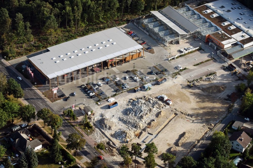 Luftbild Hohen Neuendorf - Baustelle eines neuen Einkaufszentrums und Supermarkt- Filiale von REWE in Hohen Neuendorf im Bundesland Brandenburg