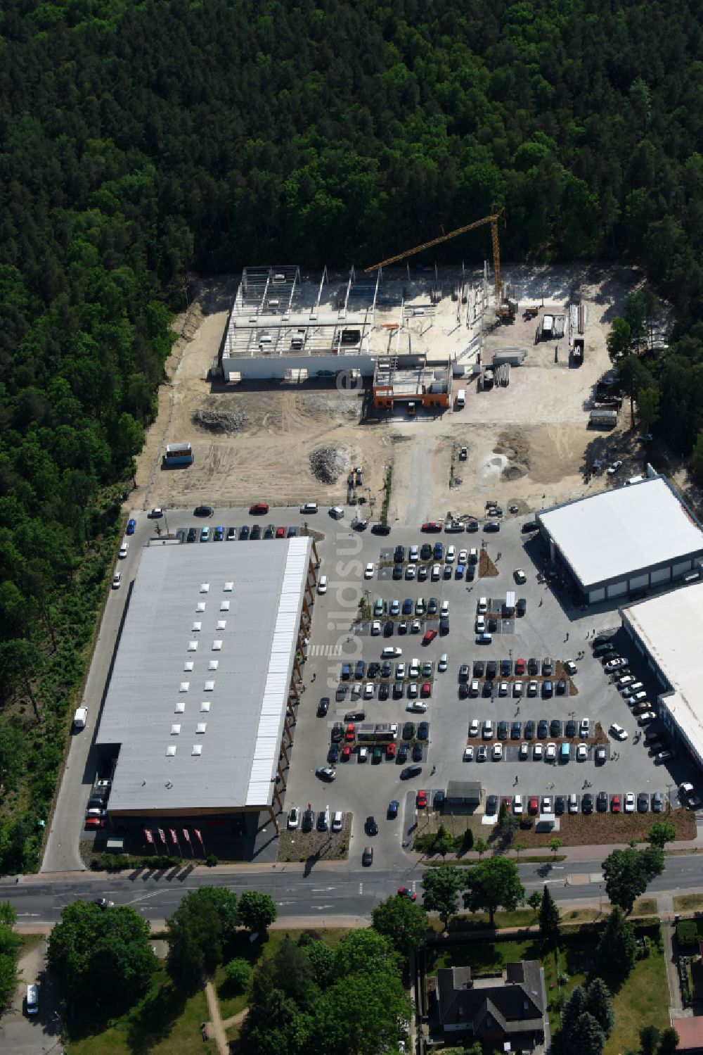 Hohen Neuendorf von oben - Baustelle eines neuen Einkaufszentrums und Supermarkt- Filiale von REWE in Hohen Neuendorf im Bundesland Brandenburg