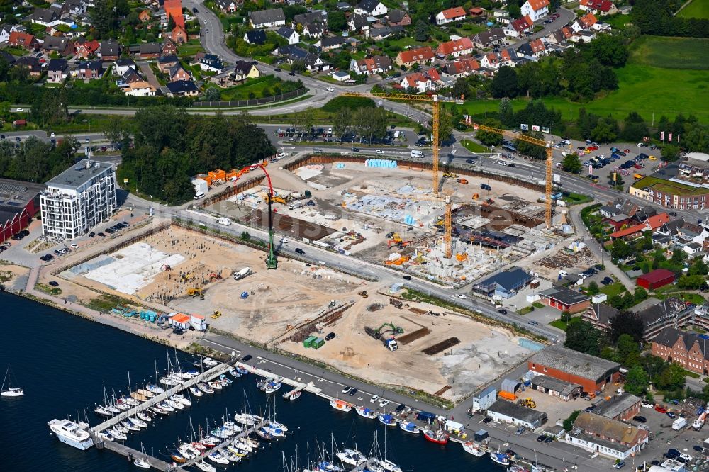 Luftaufnahme Travemünde - Baustelle Wohngebiet einer Mehrfamilienhaussiedlung Auf dem Baggersand in Travemünde im Bundesland Schleswig-Holstein, Deutschland