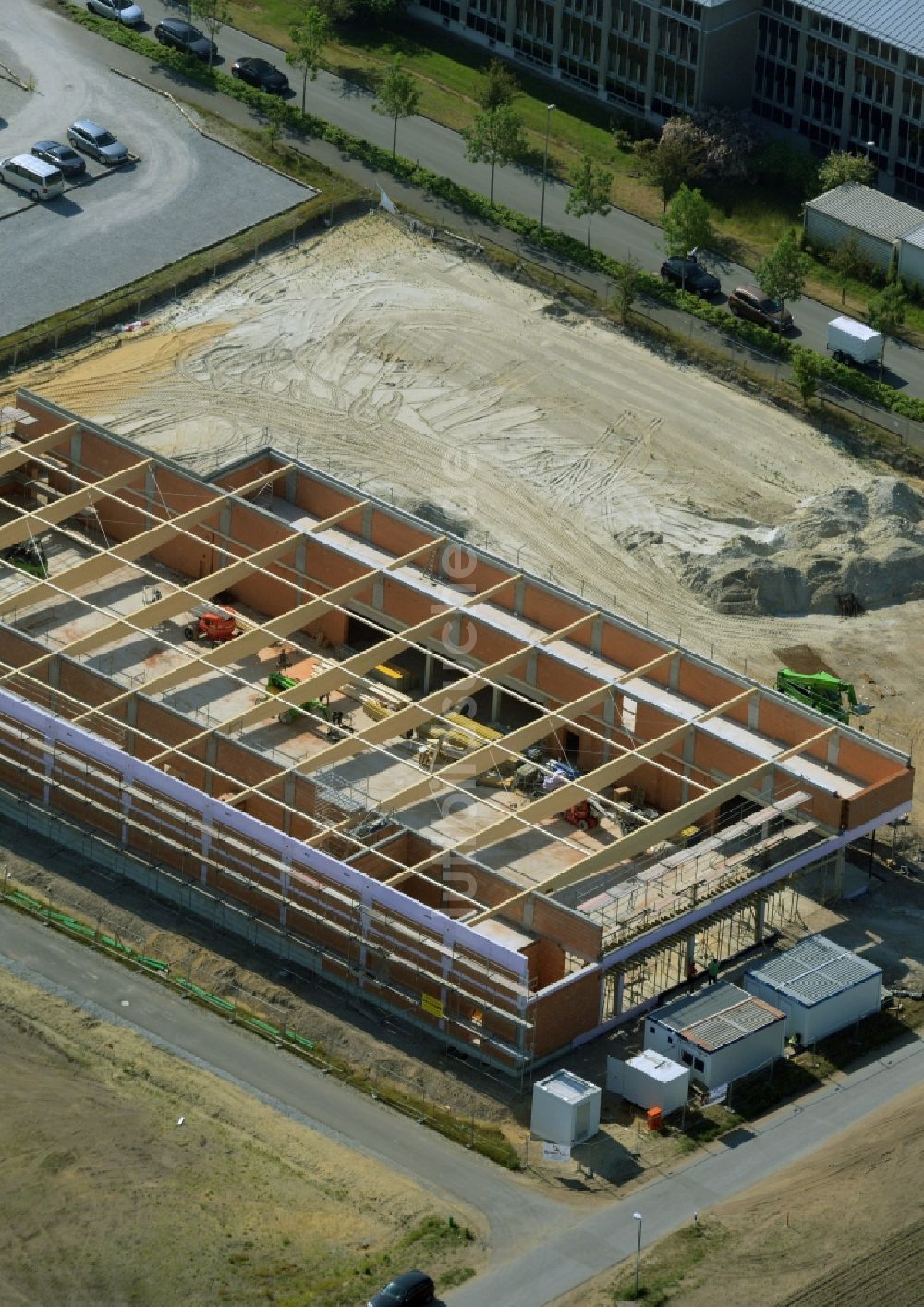 Luftaufnahme Gütersloh - Baustelle zum Neubau eines ALDI Einkaufszentrums an der Herzbrocker Straße in Gütersloh im Bundesland Nordrhein-Westfalen