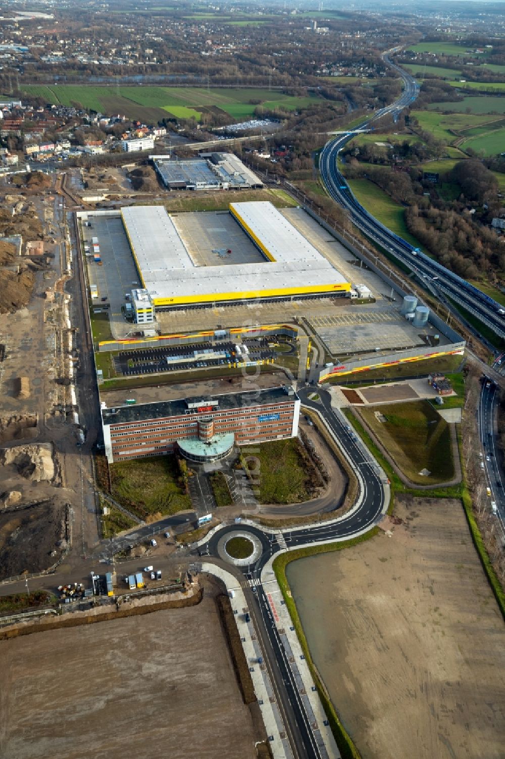 Bochum aus der Vogelperspektive: Baustelle zum Neubau eines DHL- Hub- Gebäudekomplexes auf dem Gelände des Logistikzentrums im Entwicklungsgebiet MARK 51°7 in Bochum im Bundesland Nordrhein-Westfalen, Deutschland