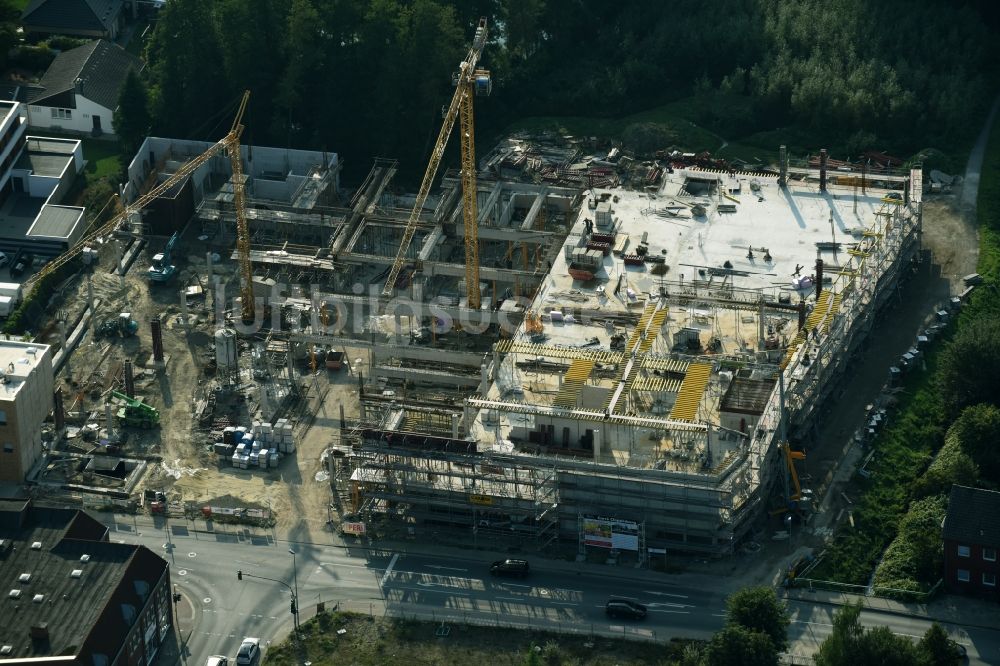 Cloppenburg von oben - Baustelle zum Neubau des Gebäudekomplexes des Einkaufszentrum Carre Cloppenburg durch die GENOS Carre Cloppenburg GmbH nach Entwürfen der Grieshop, Hamza Architekten in Cloppenburg im Bundesland Niedersachsen