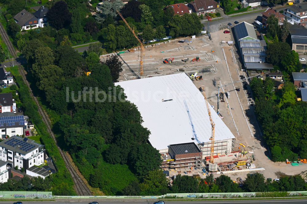 Luftbild Rheinberg - Baustelle zum Neubau des Gebäudekomplexes des Einkaufszentrum für einen Rewe-Markt in Rheinberg im Bundesland Nordrhein-Westfalen, Deutschland