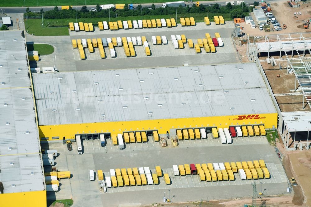 Luftaufnahme Ludwigsau - Baustelle zum Neubau eines Gebäudekomplexes auf dem Gelände des Logistikzentrums der DHL Paket GmbH Im Fuldatal in Ludwigsau im Bundesland Hessen, Deutschland