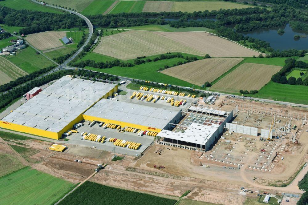 Ludwigsau aus der Vogelperspektive: Baustelle zum Neubau eines Gebäudekomplexes auf dem Gelände des Logistikzentrums der DHL Paket GmbH Im Fuldatal in Ludwigsau im Bundesland Hessen, Deutschland