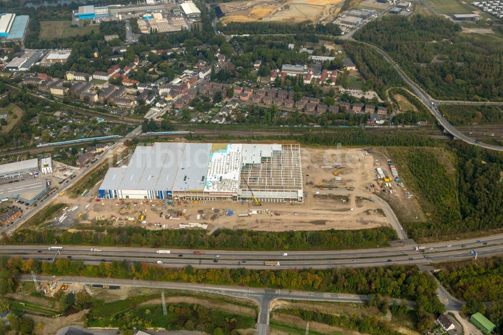 Luftaufnahme Gelsenkirchen - Baustelle zum Neubau eines Gebäudekomplexes auf dem Gelände des Logistikzentrums an der Uechtingstraße zum Verlauf der Autobahn BAB A42 in Gelsenkirchen im Bundesland Nordrhein-Westfalen, Deutschland