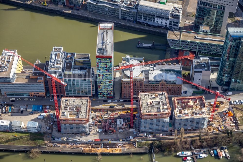 Luftbild Düsseldorf - Baustelle zum Neubau des Hochhaus- Gebäudekomplexes Düsseldorfer Heimathafen in der Speditionstraße in Düsseldorf im Bundesland Nordrhein-Westfalen, Deutschland