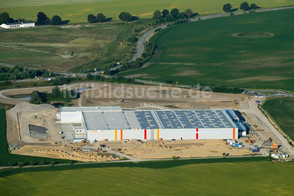 Luftaufnahme Dummerstorf - Baustelle zum Neubau eines Logistikzentrums der Nor­ma Le­bens­mit­tel­fi­li­al­be­trieb Stif­tung & Co. KG in Dummerstorf im Bundesland Mecklenburg-Vorpommern, Deutschland