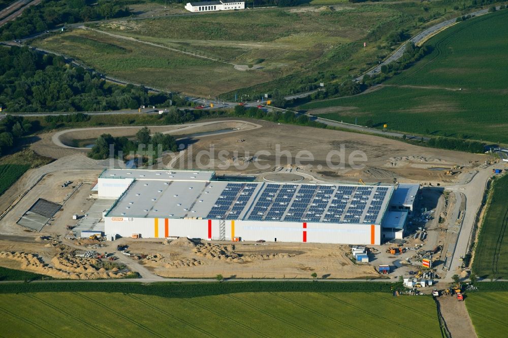 Dummerstorf aus der Vogelperspektive: Baustelle zum Neubau eines Logistikzentrums der Nor­ma Le­bens­mit­tel­fi­li­al­be­trieb Stif­tung & Co. KG in Dummerstorf im Bundesland Mecklenburg-Vorpommern, Deutschland