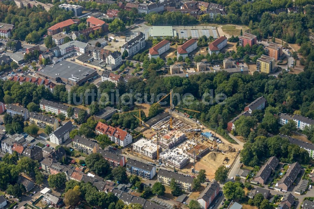 Herne von oben - Baustelle zum Neubau einer Mehrfamilienhaus-Wohnanlage Albert-Schweitzer-Carré in Herne im Bundesland Nordrhein-Westfalen, Deutschland