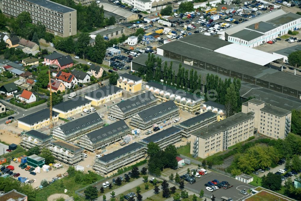 Berlin aus der Vogelperspektive: Baustelle zum Neubau einer Mehrfamilienhaus-Wohnanlage dem Arendscarree “ am Arendsweg im Ortsteil Lichtenberg in Berlin, Deutschland