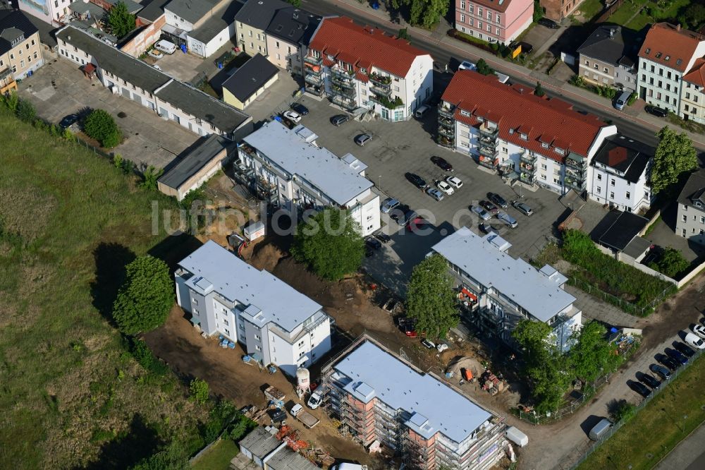 Bernau von oben - Baustelle zum Neubau einer Mehrfamilienhaus-Wohnanlage an der Breitscheidstraße in Bernau im Bundesland Brandenburg, Deutschland