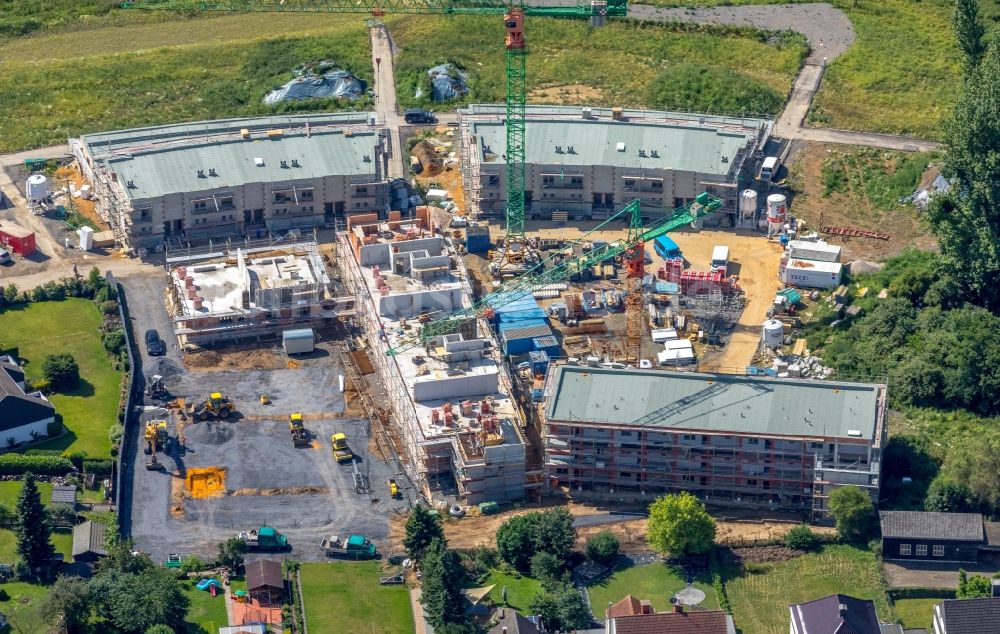 Luftaufnahme Dortmund - Baustelle zum Neubau einer Mehrfamilienhaus-Wohnanlage Energie-Plus-Siedlung der Spar- und Bauverein eG Dortmund am Daelweg in Dortmund im Bundesland Nordrhein-Westfalen, Deutschland