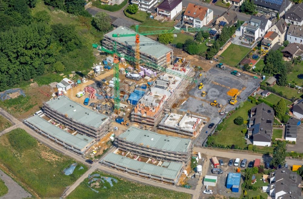 Dortmund von oben - Baustelle zum Neubau einer Mehrfamilienhaus-Wohnanlage Energie-Plus-Siedlung der Spar- und Bauverein eG Dortmund am Daelweg in Dortmund im Bundesland Nordrhein-Westfalen, Deutschland