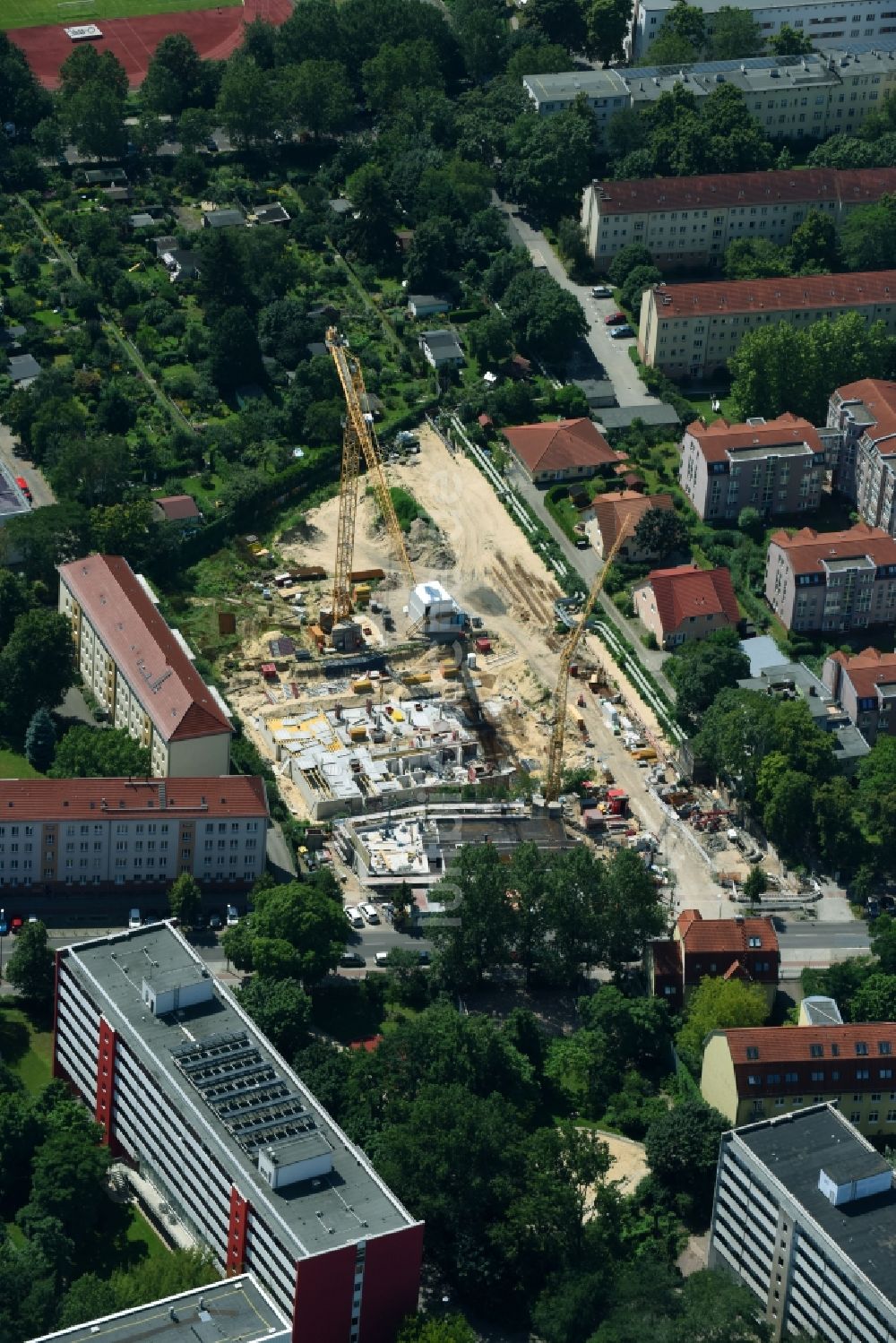 Luftbild Berlin - Baustelle zum Neubau einer Mehrfamilienhaus-Wohnanlage entlang der Einbecker Straße in Berlin, Deutschland