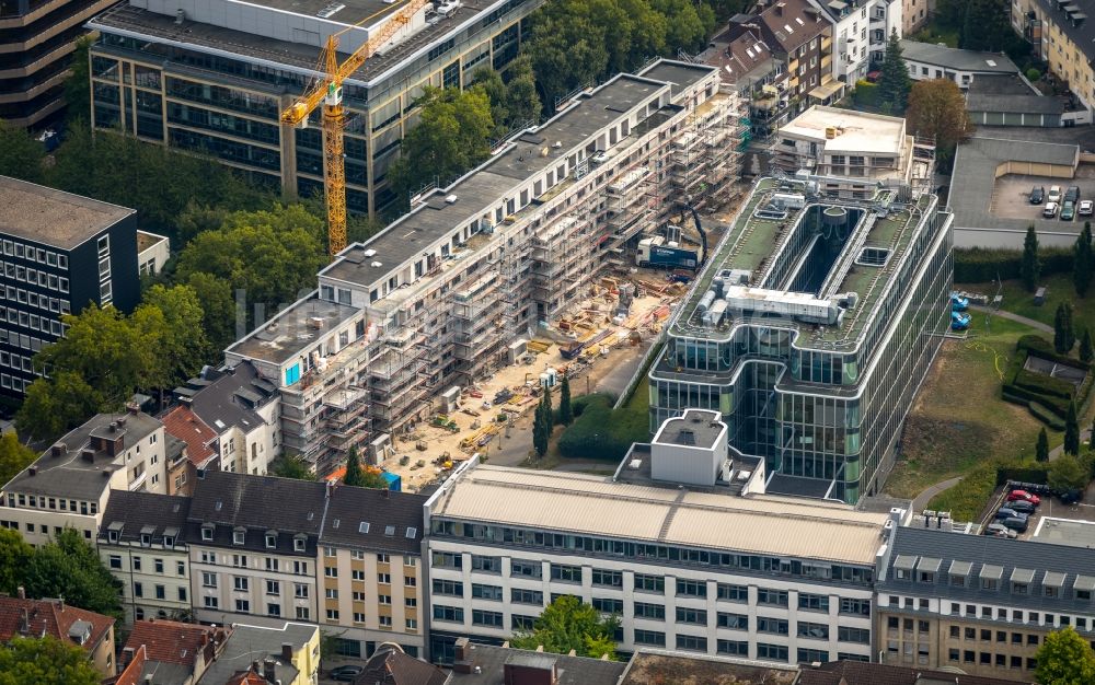 Essen aus der Vogelperspektive: Baustelle zum Neubau einer Mehrfamilienhaus-Wohnanlage der HOPF Immobilien-Entwicklungs-GmbH & Co. KG in Essen im Bundesland Nordrhein-Westfalen, Deutschland