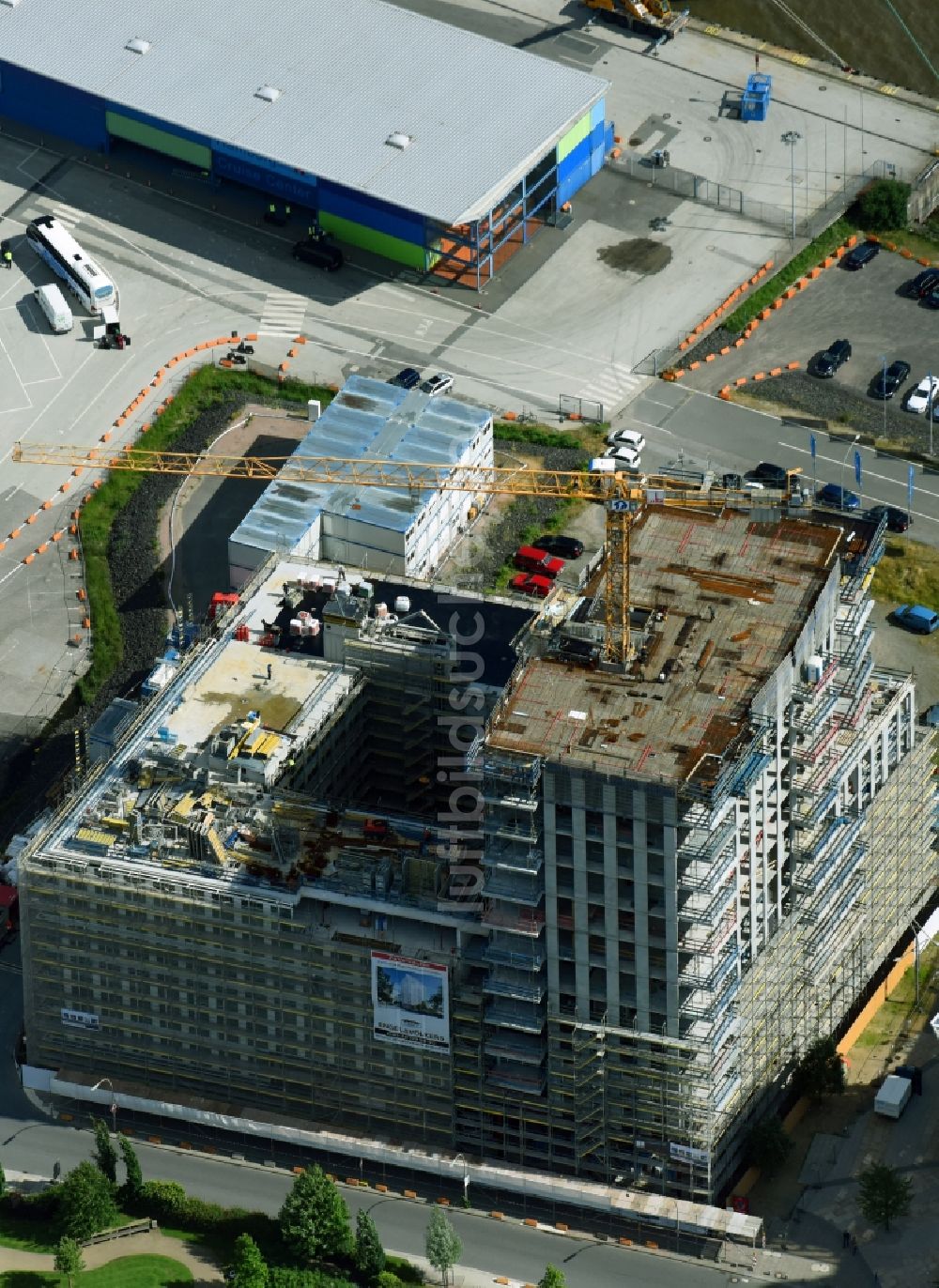 Luftbild Hamburg - Baustelle zum Neubau einer Mehrfamilienhaus-Wohnanlage des Immobilienunternehmens Engel & Völkers im Ortsteil Hafencity in Hamburg, Deutschland