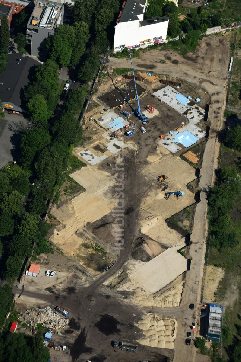 Berlin aus der Vogelperspektive: Baustelle zum Neubau einer Mehrfamilienhaus-Wohnanlage Kruppstraße - Lehrter Straße in Berlin