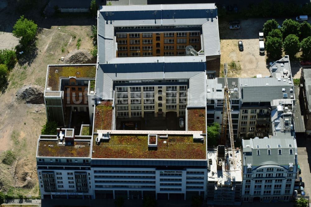 Luftbild Berlin - Baustelle zum Neubau einer Mehrfamilienhaus-Wohnanlage an der Michaelkirchstraße im Ortsteil Mitte in Berlin, Deutschland