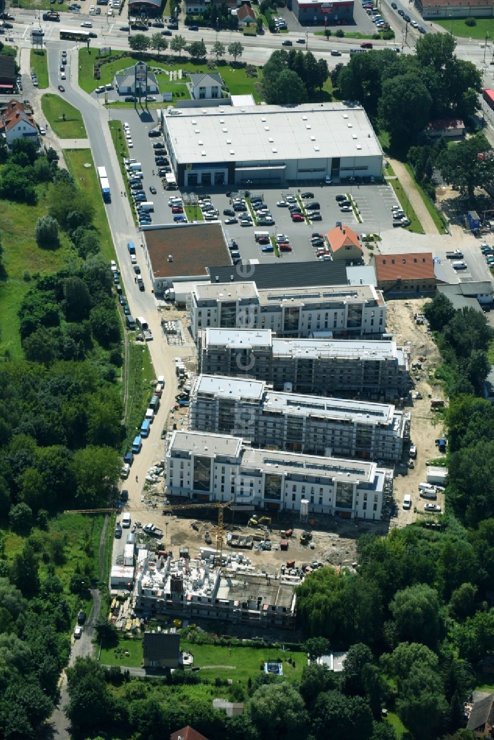 Luftbild Berlin - Baustelle zum Neubau einer Mehrfamilienhaus-Wohnanlage An der Schule im Stadtteil Mahlsdorf in Berlin