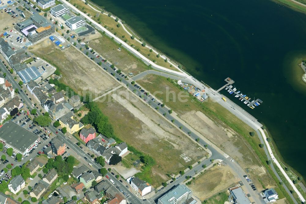 Dortmund von oben - Baustelle zum Neubau einer Mehrfamilienhaus- Wohnanlage am Ufer des Phoenix Sees in Dortmund im Bundesland Nordrhein-Westfalen