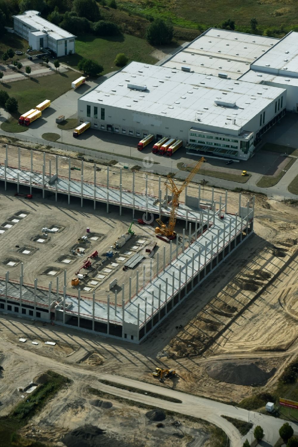 Trebbin von oben - Baustelle zum Neubau des Poco - Domäne- Zentrallager in Trebbin im Bundesland Brandenburg