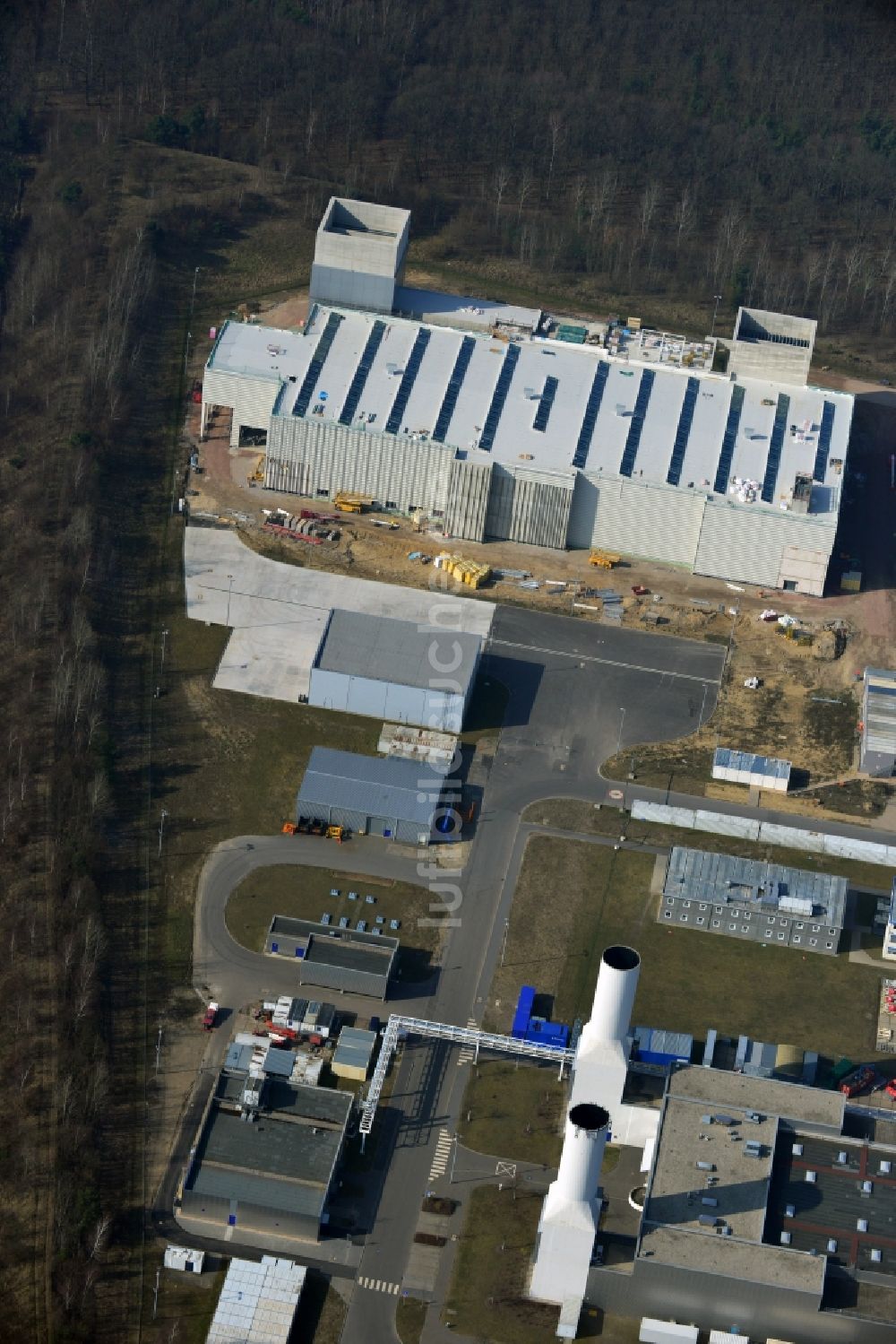 Dahlewitz aus der Vogelperspektive: Baustelle zum Neubau eines Triebwerks- Prüfstandes im Rolls Royce Werk in Dahlewitz im Bundesland Brandenburg