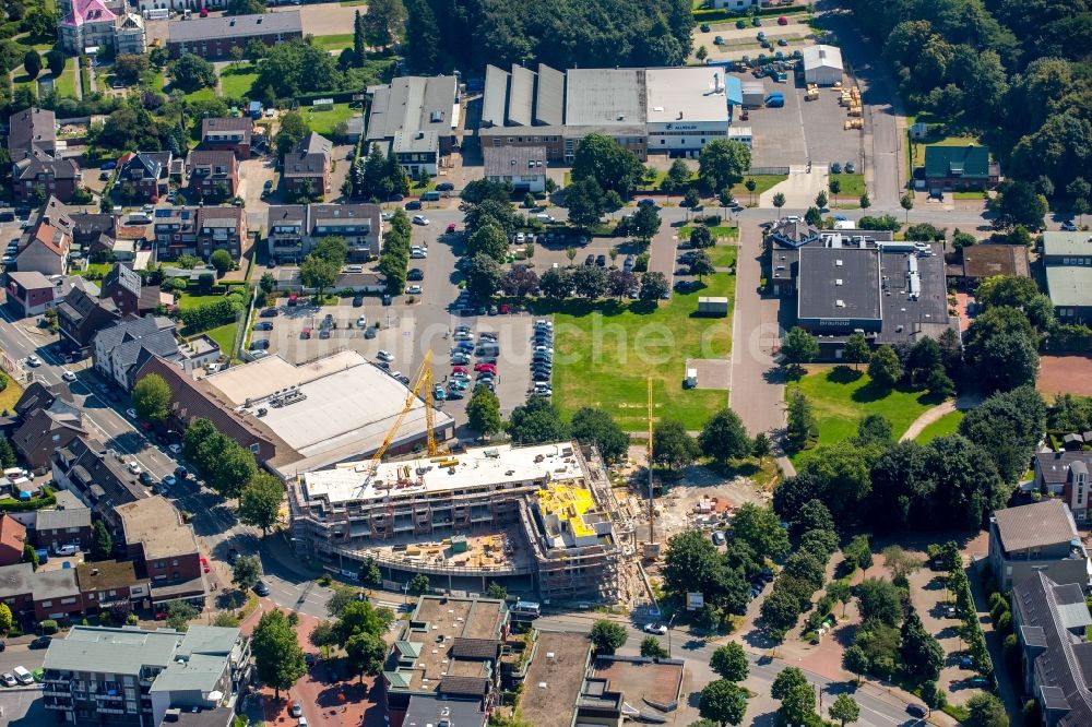 Kirchhellen von oben - Baustelle zum Neubau eines Wohn- und Geschäftshauses in der Ortsmitte an der Hauptstraße in Kirchhellen im Bundesland Nordrhein-Westfalen