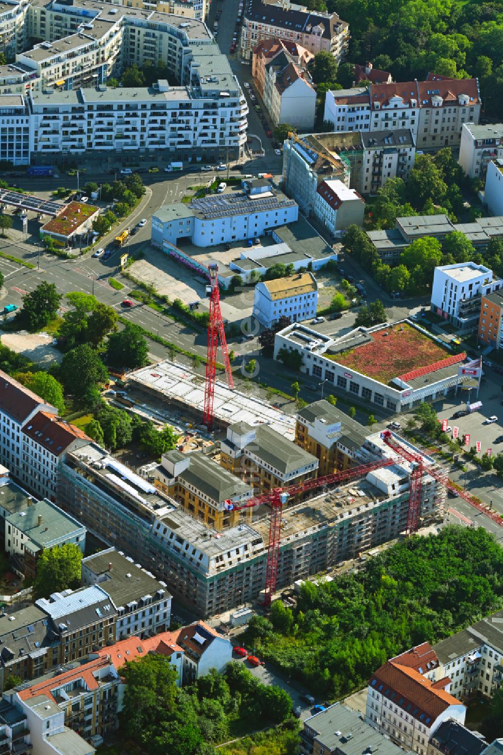 Leipzig aus der Vogelperspektive: Baustelle zum Neubau eines Wohn- und Geschäftshauses Quartiers Kreuzstraße in Leipzig im Bundesland Sachsen, Deutschland