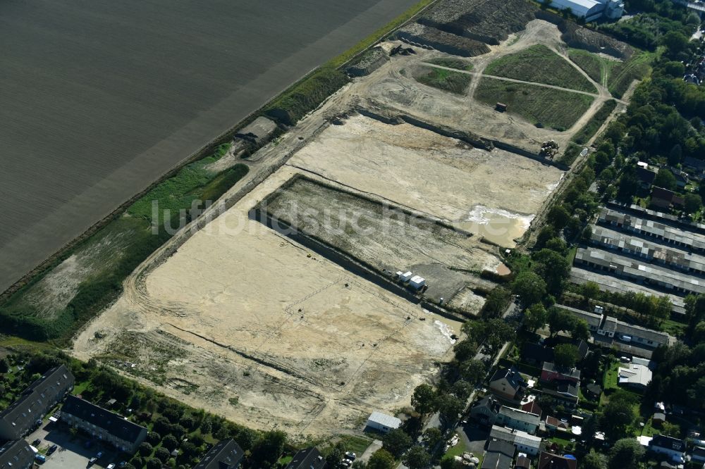 Rüdersdorf von oben - Baustelle zur Vorbereitung einer Wohnbaufläche an der Woltersdorfer Straße in Rüdersdorf im Bundesland Brandenburg