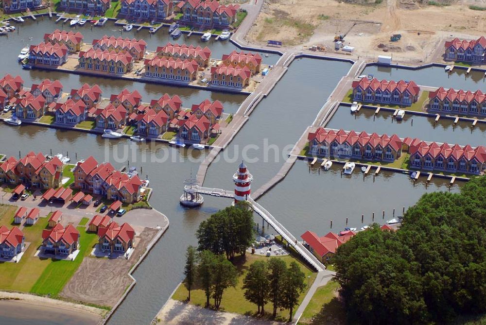 Luftaufnahme Rheinsberg - Blick auf das fast fertige Hafendorf Rheinsberg