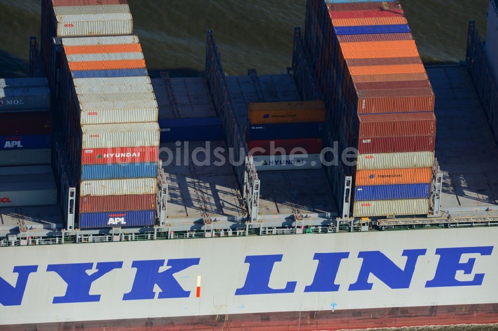 Cuxhaven von oben - Containerschiff - Frachter NYK Hercules der Reederei NYK LINE GmbH bei der Fahrt vor der Nordseeküste bei Cuxhaven im Bundesland Niedersachsen