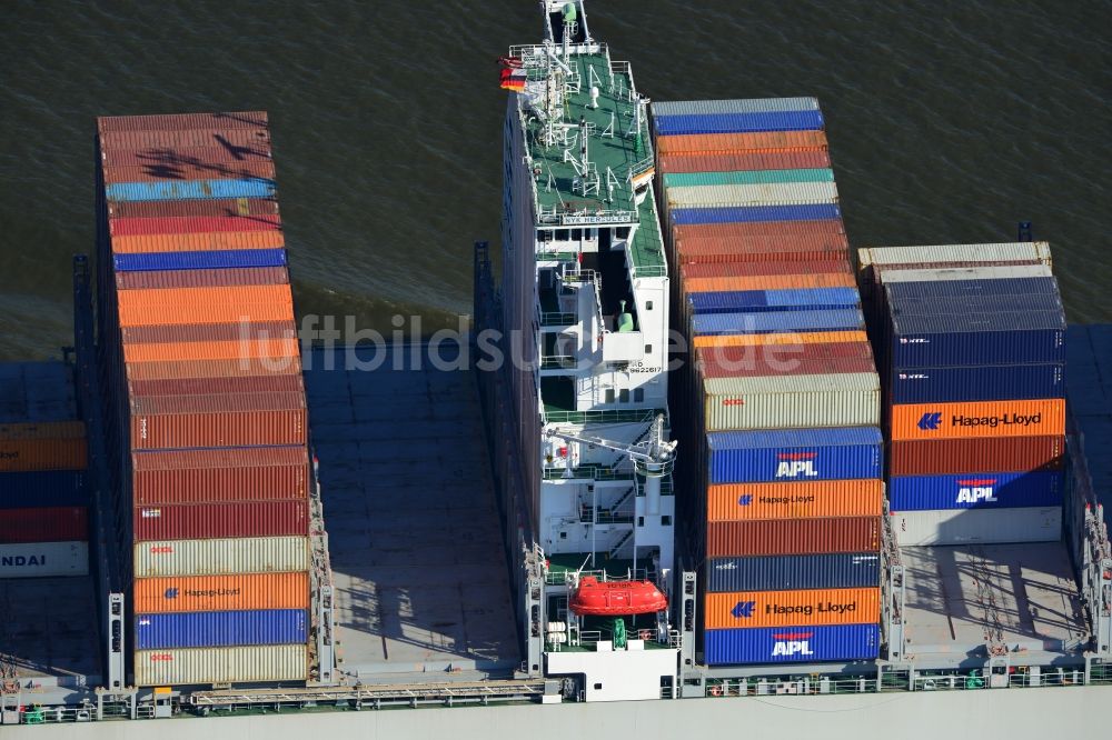 Cuxhaven aus der Vogelperspektive: Containerschiff - Frachter NYK Hercules der Reederei NYK LINE GmbH bei der Fahrt vor der Nordseeküste bei Cuxhaven im Bundesland Niedersachsen