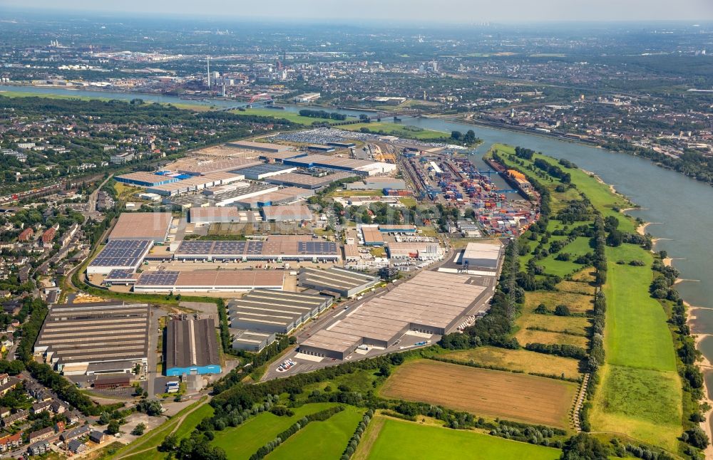 Duisburg von oben - Containerterminal im Containerhafen des Binnenhafen Rheinhausen am Ufer des Hochwasser führenden Flußverlaufes des Rhein in Duisburg im Bundesland Nordrhein-Westfalen