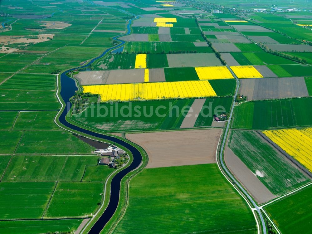 Luftbild Emden - Die Landschaft am Ems-Jade-Kanal im Stadtteil Uphusen in Emden im Bundesland Niedersachsen