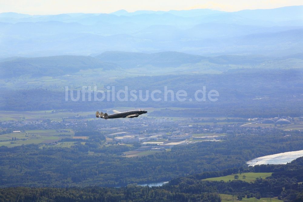 Luftaufnahme Rheinfelden (Baden) - Die Lockheed Super Constellation im Flug über dem Dinkelberg bei Rheinfelden im Bundesland Baden-Württemberg