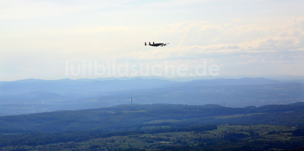 Luftaufnahme Rheinfelden (Baden) - Die Lockheed Super Constellation im Flug über dem Dinkelberg bei Rheinfelden im Bundesland Baden-Württemberg