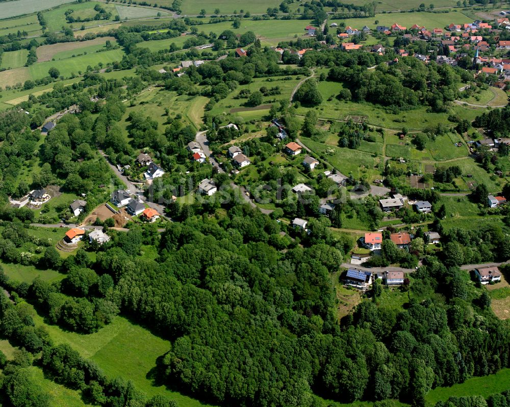 Ulrichstein aus der Vogelperspektive: Dorf - Ansicht am Rande von Waldgebieten in Ulrichstein im Bundesland Hessen, Deutschland