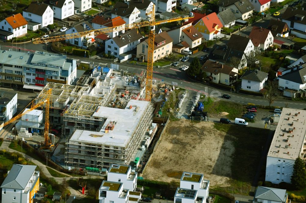 Heusenstamm von oben - Eckhaus- Baustelle zum Neubau eines Wohn- und Geschäftshauses an der Leibnitzstraße in Heusenstamm im Bundesland Hessen, Deutschland