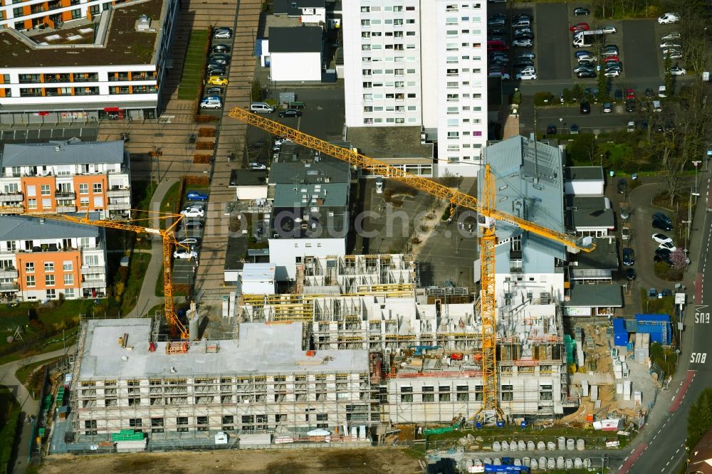 Luftbild Heusenstamm - Eckhaus- Baustelle zum Neubau eines Wohn- und Geschäftshauses an der Leibnitzstraße in Heusenstamm im Bundesland Hessen, Deutschland