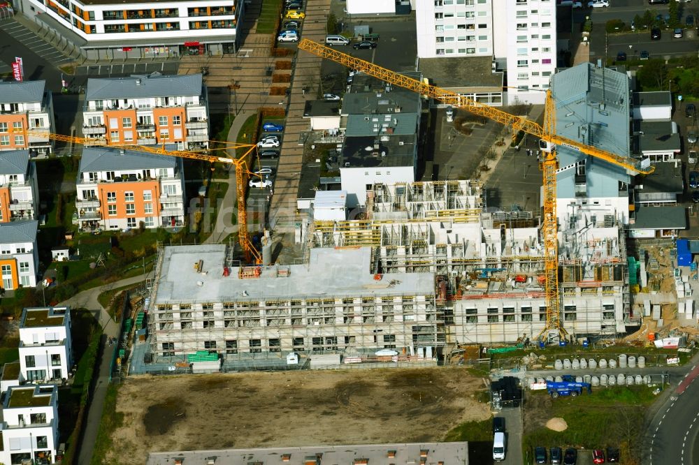 Luftaufnahme Heusenstamm - Eckhaus- Baustelle zum Neubau eines Wohn- und Geschäftshauses an der Leibnitzstraße in Heusenstamm im Bundesland Hessen, Deutschland