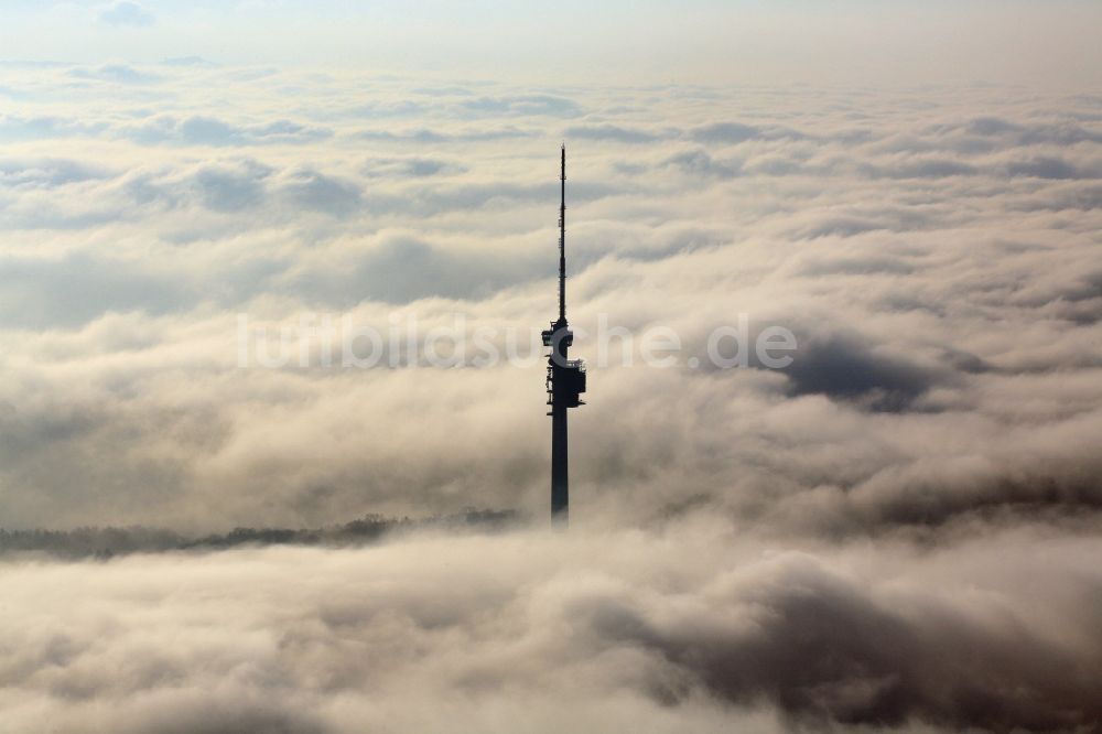 Luftaufnahme Bettingen - Fernmeldeturm und Fernsehturm St. Chrischona ragt aus der Nebeldecke bei Bettingen in Basel, Schweiz