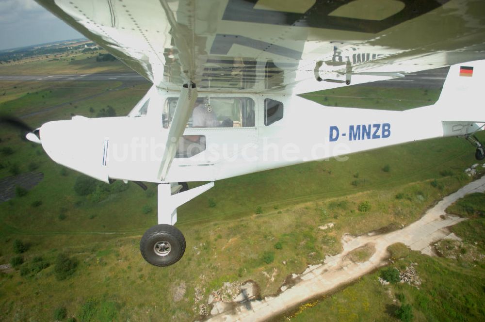 Werneuchen aus der Vogelperspektive: Fisheye-Perspektive auf das Ultraleichtflugzeug WT-01 der Agentur bei einem Flug in der Nähe des Flugplatzes Werneuchen